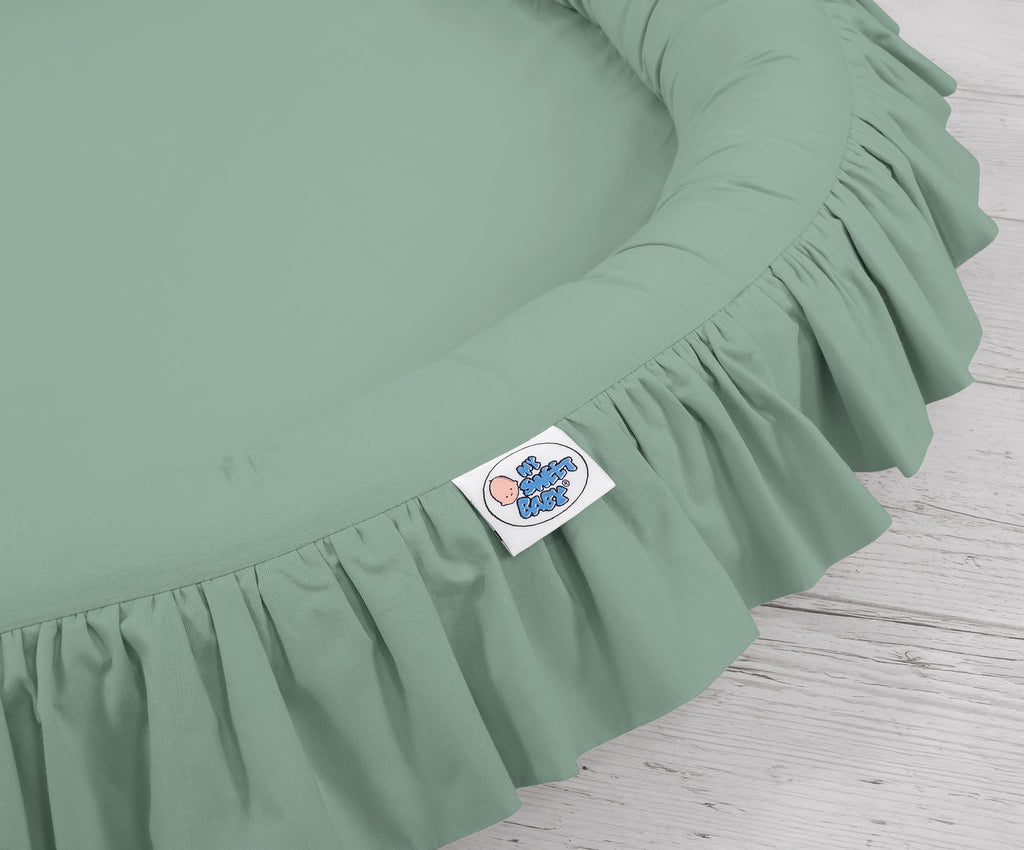 Nest with flounce - pastel green