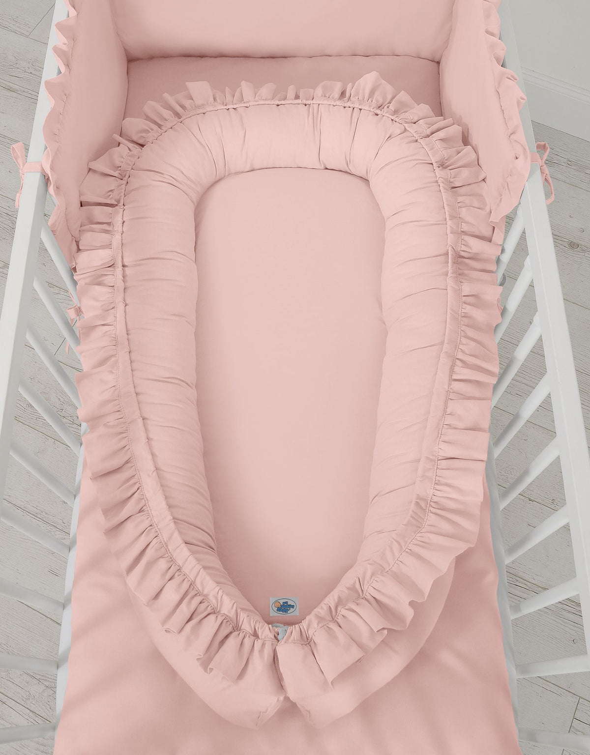 Baby nest Premium Cocoon for infants with a ruffle - pastel pink