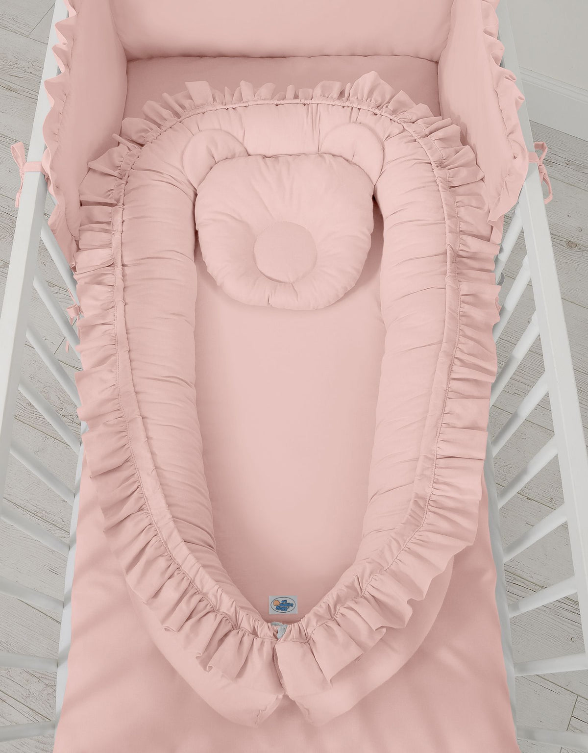 Baby nest Premium Cocoon for infants with a ruffle - pastel pink